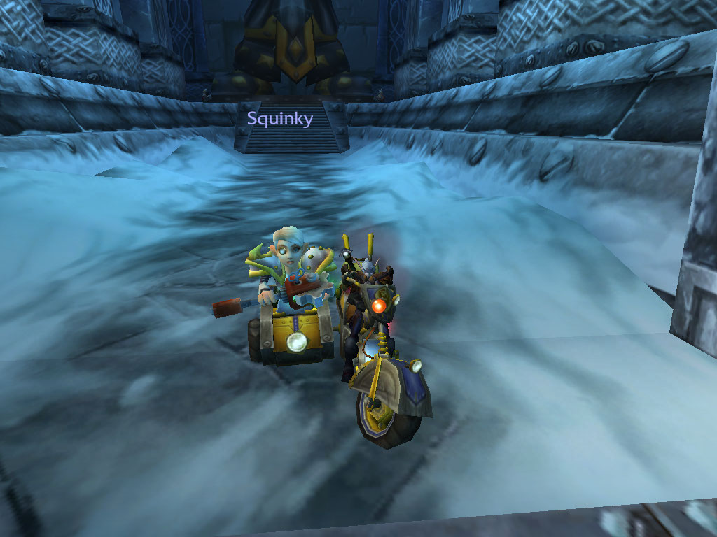 A character on a motorcycle with sidecar in an icy hall